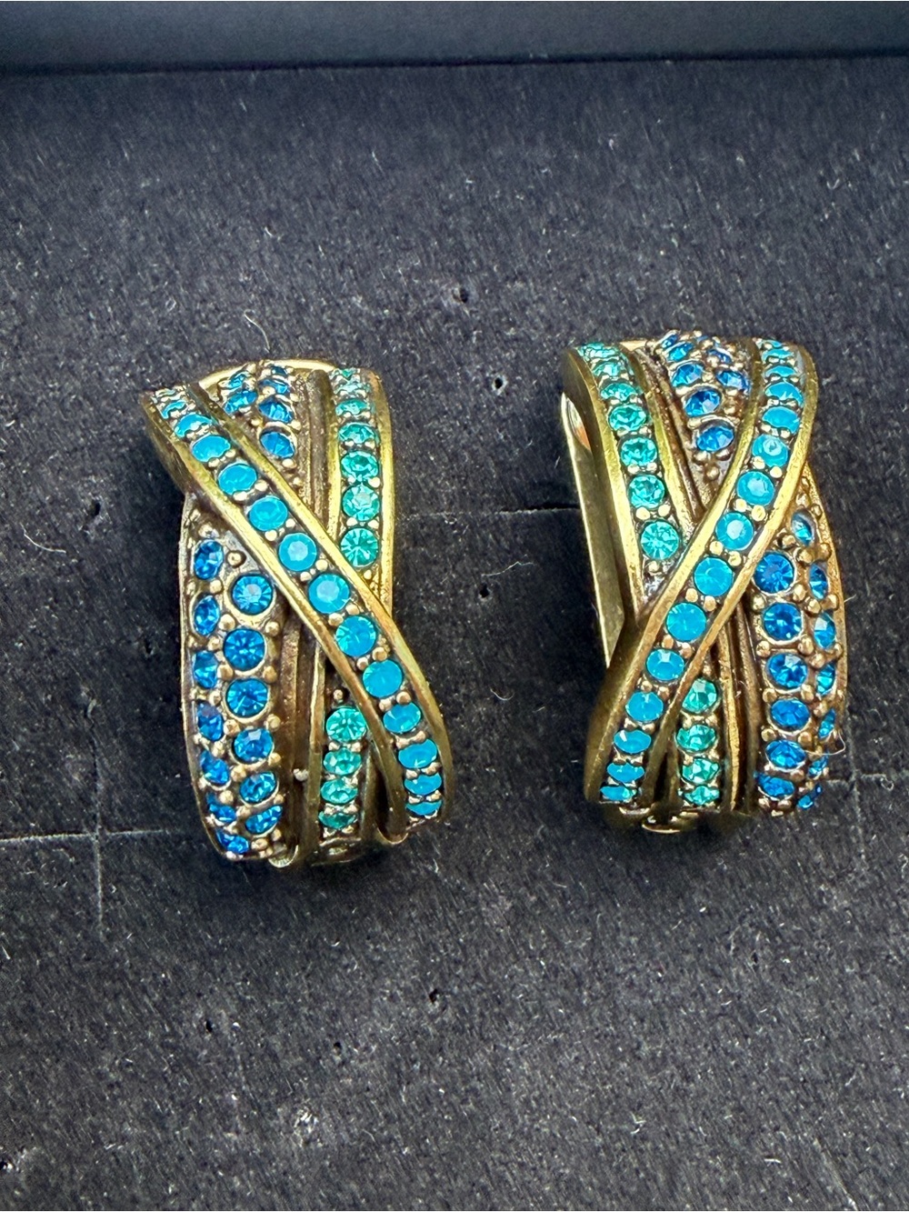 Heidi Daus "Ice Princess"
Crystal Deco Half-Hoop Earrings.